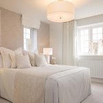 Bright, modern bedroom with neutral decor.