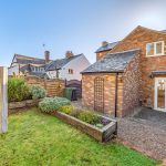 Charming English cottage with garden and patio.