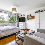 Modern bedroom with balcony view and stylish decor