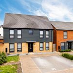 Modern detached house with driveway and garden