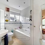 Bright bathroom with bathtub and modern decor