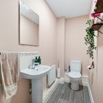 Modern bathroom with sink and toilet