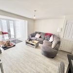 Cosy living room with dog in crate